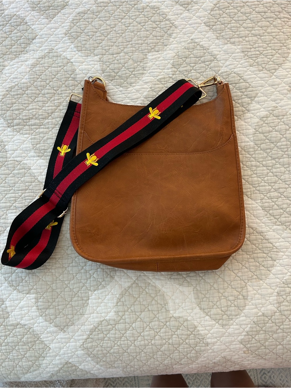 Tan Leather Crossbody Bag with Decorative Black & Red Bee Strap